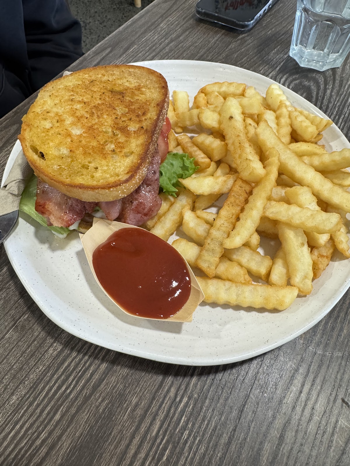 Toasted BLT sandwich with crinkle cut fries